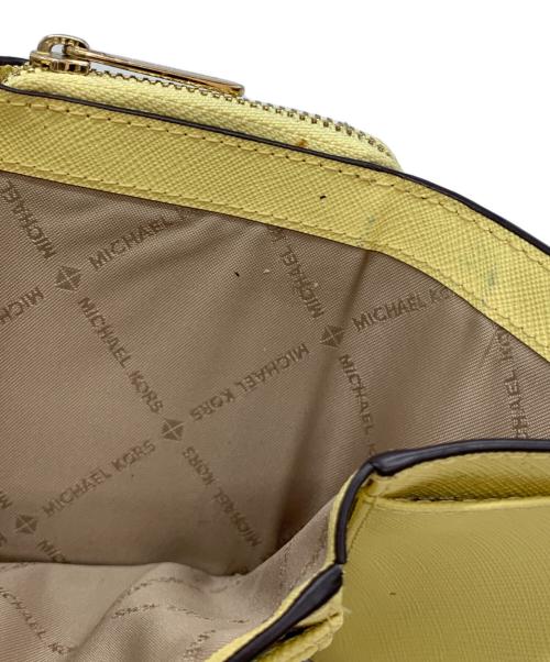 MICHAEL KORS（マイケルコース）MICHAEL KORS (マイケルコース) 3つ折り財布 イエローの古着・服飾アイテム