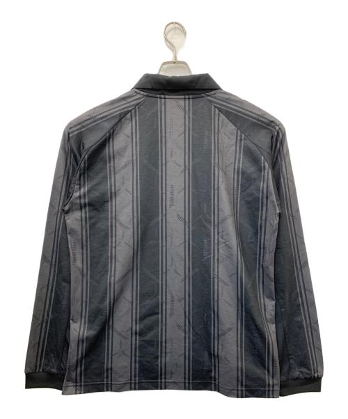NEW BALANCE（ニューバランス）NEW BALANCE (ニューバランス) Black Out グラフィック ポロロングスリーブシャツ ブラック サイズ:XLの古着・服飾アイテム