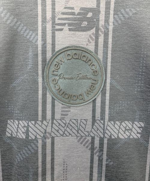 NEW BALANCE（ニューバランス）NEW BALANCE (ニューバランス) Black Out グラフィック ポロロングスリーブシャツ ブラック サイズ:XLの古着・服飾アイテム