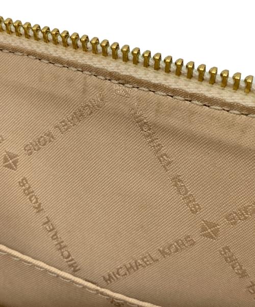 MICHAEL KORS（マイケルコース）MICHAEL KORS (マイケルコース) JET SET TRAVEL MD DOME XBODY アイボリーの古着・服飾アイテム