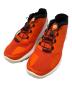 SALOMON（サロモン）の古着「ランニングシューズ」｜オレンジ