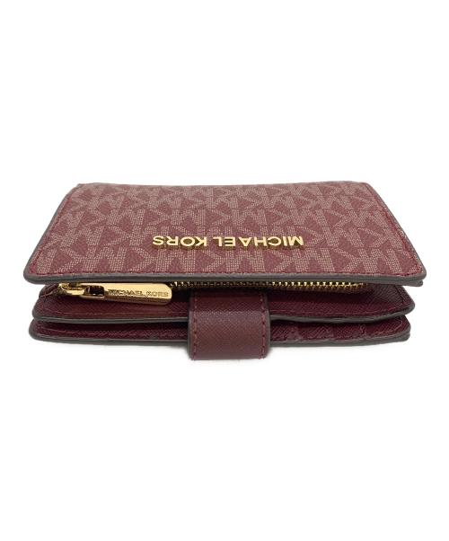 MICHAEL KORS（マイケル・コース）MICHAEL KORS (マイケル・コース) 財布 パープルの古着・服飾アイテム
