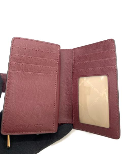 MICHAEL KORS（マイケル・コース）MICHAEL KORS (マイケル・コース) 財布 パープルの古着・服飾アイテム