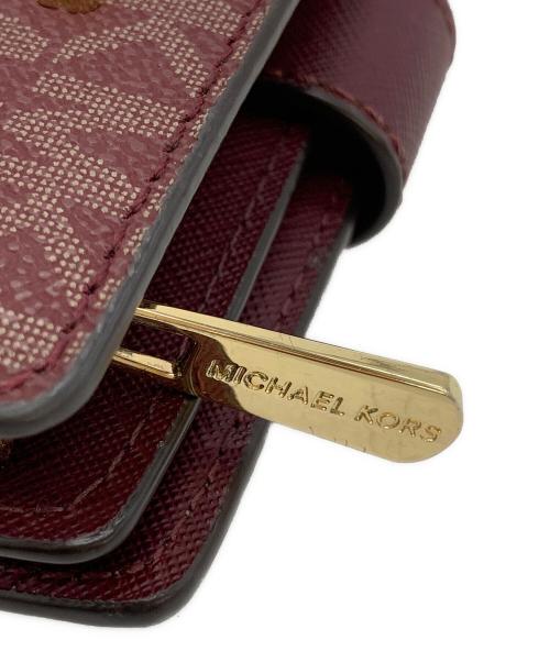MICHAEL KORS（マイケル・コース）MICHAEL KORS (マイケル・コース) 財布 パープルの古着・服飾アイテム