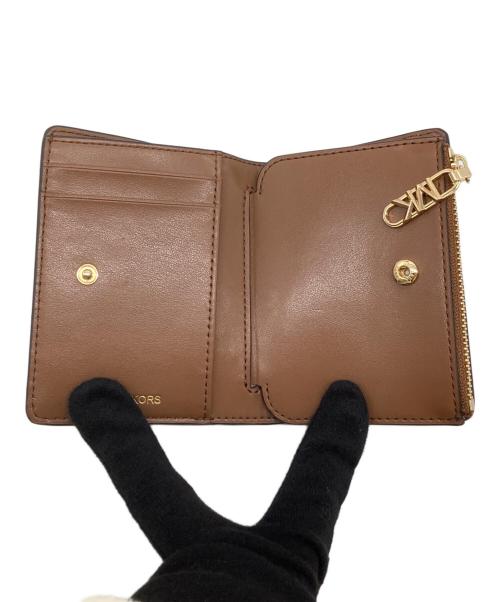MICHAEL KORS（マイケル・コース）MICHAEL KORS (マイケルコース) 二つ折り財布 ブラウンの古着・服飾アイテム