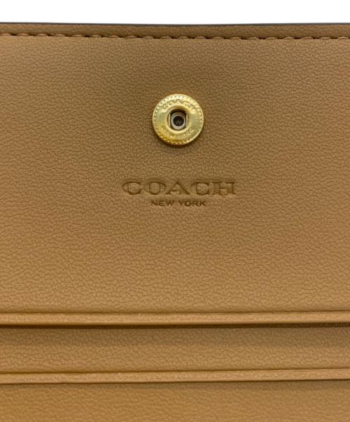 COACH（コーチ）COACH (コーチ) 二つ折り財布 ブラウン×ホワイトの古着・服飾アイテム