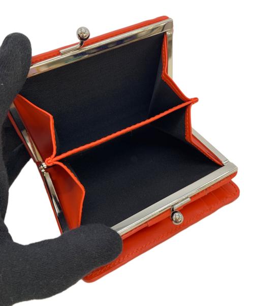 PAUL SMITH（ポールスミス）Paul Smith (ポールスミス) がま口二つ折り財布 オレンジの古着・服飾アイテム