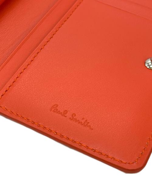 PAUL SMITH（ポールスミス）Paul Smith (ポールスミス) がま口二つ折り財布 オレンジの古着・服飾アイテム