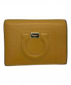 Salvatore Ferragamoサルヴァトーレ フェラガモ）の古着「2つ折り財布 ガンチーニ」｜オレンジ