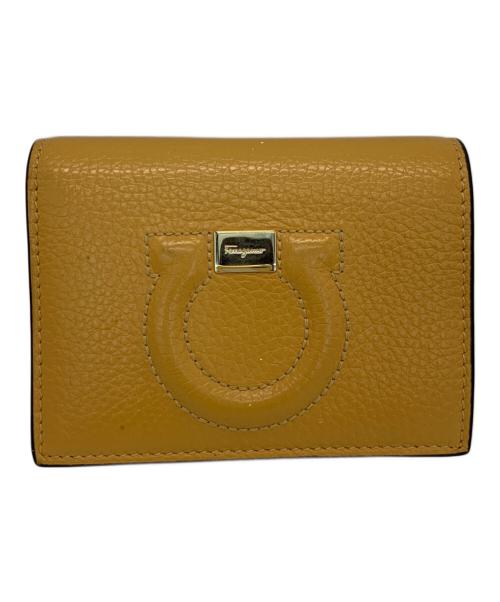 Salvatore Ferragamo（サルヴァトーレ フェラガモ）Salvatore Ferragamo (サルヴァトーレ フェラガモ) 2つ折り財布 ガンチーニ オレンジの古着・服飾アイテム