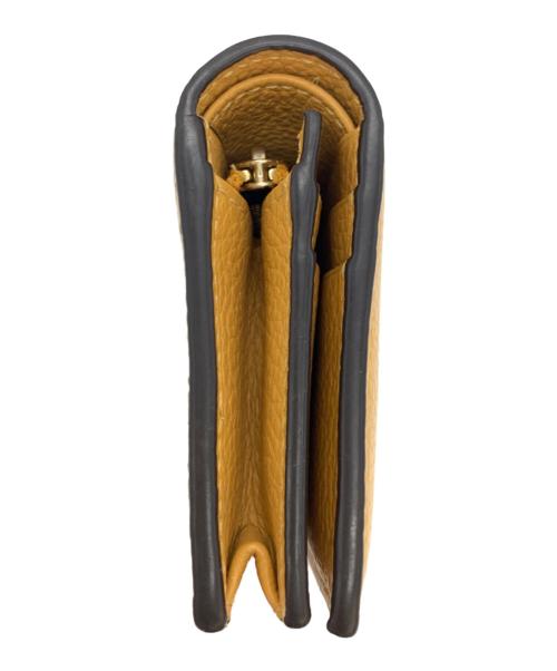 Salvatore Ferragamo（サルヴァトーレ フェラガモ）Salvatore Ferragamo (サルヴァトーレ フェラガモ) 2つ折り財布 ガンチーニ オレンジの古着・服飾アイテム