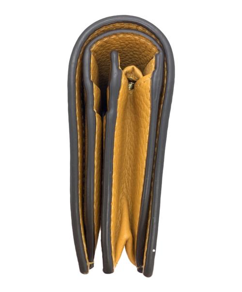 Salvatore Ferragamo（サルヴァトーレ フェラガモ）Salvatore Ferragamo (サルヴァトーレ フェラガモ) 2つ折り財布 ガンチーニ オレンジの古着・服飾アイテム