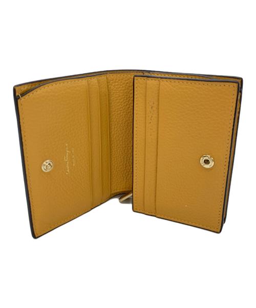 Salvatore Ferragamo（サルヴァトーレ フェラガモ）Salvatore Ferragamo (サルヴァトーレ フェラガモ) 2つ折り財布 ガンチーニ オレンジの古着・服飾アイテム