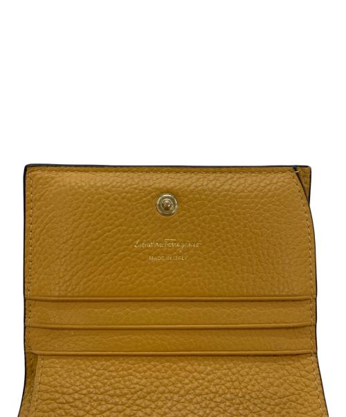Salvatore Ferragamo（サルヴァトーレ フェラガモ）Salvatore Ferragamo (サルヴァトーレ フェラガモ) 2つ折り財布 ガンチーニ オレンジの古着・服飾アイテム