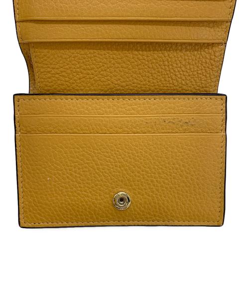 Salvatore Ferragamo（サルヴァトーレ フェラガモ）Salvatore Ferragamo (サルヴァトーレ フェラガモ) 2つ折り財布 ガンチーニ オレンジの古着・服飾アイテム