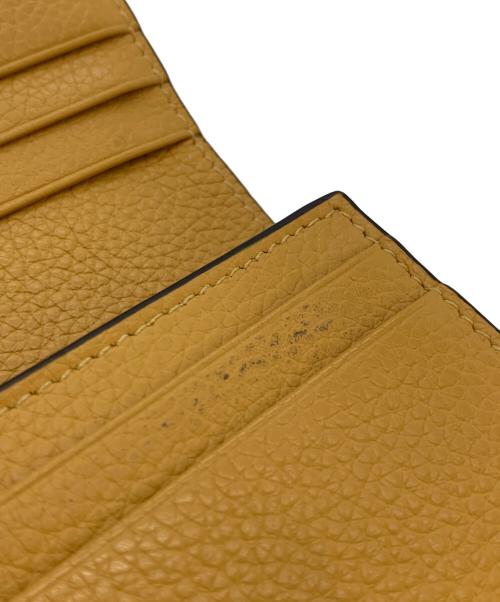 Salvatore Ferragamo（サルヴァトーレ フェラガモ）Salvatore Ferragamo (サルヴァトーレ フェラガモ) 2つ折り財布 ガンチーニ オレンジの古着・服飾アイテム