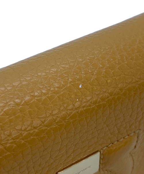 Salvatore Ferragamo（サルヴァトーレ フェラガモ）Salvatore Ferragamo (サルヴァトーレ フェラガモ) 2つ折り財布 ガンチーニ オレンジの古着・服飾アイテム