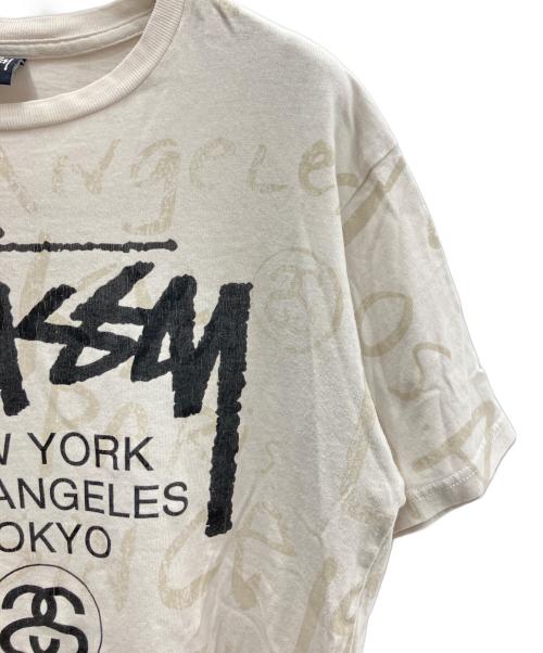 stussy（ステューシー）stussy (ステューシー) 00'sワールドツアーカットソー アイボリー サイズ:Ｍの古着・服飾アイテム