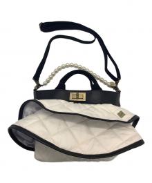 Rapture（ラプチャー）の古着「2WAYフリルバッグ」｜ホワイト×ブラック