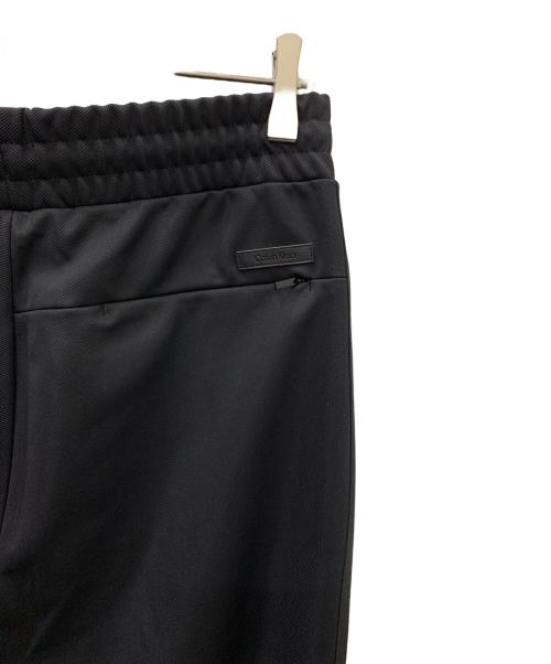 Calvin Klein（カルバンクライン）Calvin Klein (カルバンクライン) Calvin Klein(カルバンクライン)ストレッチ ツイルトラック パンツ 40EM251 ブラック サイズ:W76の古着・服飾アイテム