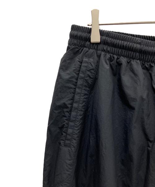 NIKE（ナイキ）NIKE (ナイキ) オーバーサイズド ウーブン トラックパンツ ブラック サイズ:L 未使用品の古着・服飾アイテム