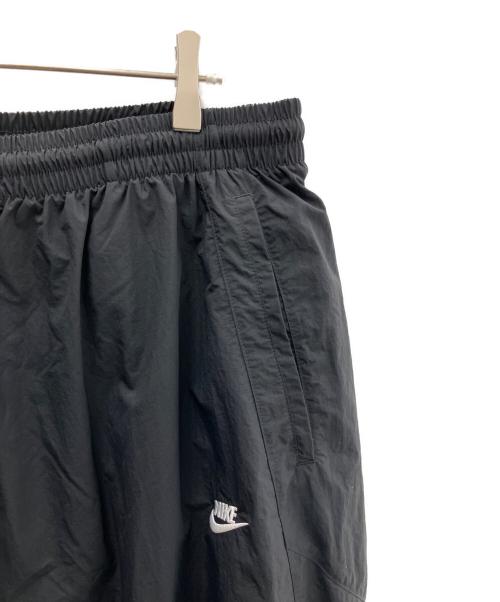 NIKE（ナイキ）NIKE (ナイキ) オーバーサイズド ウーブン トラックパンツ ブラック サイズ:L 未使用品の古着・服飾アイテム