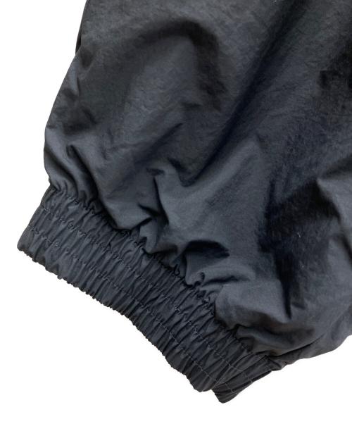 NIKE（ナイキ）NIKE (ナイキ) オーバーサイズド ウーブン トラックパンツ ブラック サイズ:L 未使用品の古着・服飾アイテム
