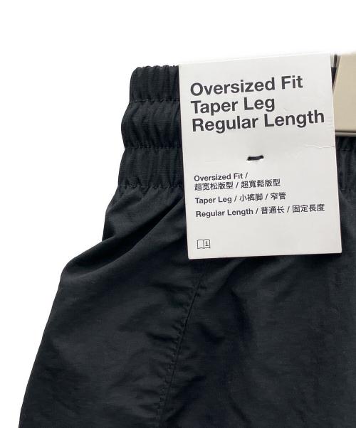 NIKE（ナイキ）NIKE (ナイキ) オーバーサイズド ウーブン トラックパンツ ブラック サイズ:L 未使用品の古着・服飾アイテム
