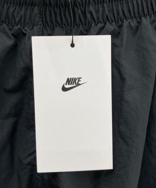 NIKE（ナイキ）NIKE (ナイキ) オーバーサイズド ウーブン トラックパンツ ブラック サイズ:L 未使用品の古着・服飾アイテム