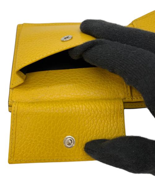 GUCCI（グッチ）GUCCI (グッチ) インターロッキングG 2つ折り財布 ブラック×イエローの古着・服飾アイテム