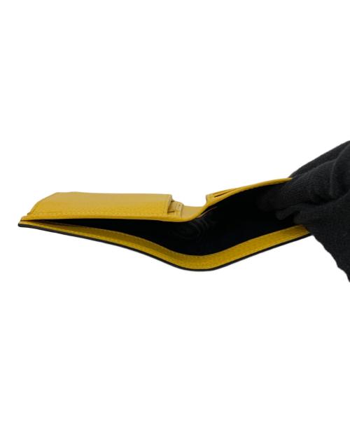 GUCCI（グッチ）GUCCI (グッチ) インターロッキングG 2つ折り財布 ブラック×イエローの古着・服飾アイテム