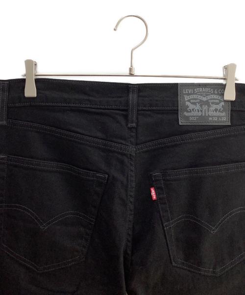 LEVI'S（リーバイス）LEVI'S (リーバイス) Levi's(リーバイス)502 レギュラーテーパード ストレッチ素材 カラーパンツ ブラック サイズ:81cm (W32)の古着・服飾アイテム
