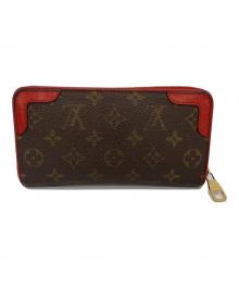 LOUIS VUITTON（ルイ ヴィトン）の古着「長財布」｜ブラウン×レッド