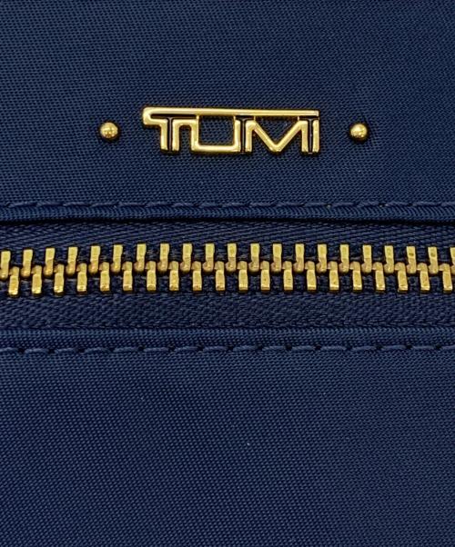 TUMI（トゥミ）TUMI (トゥミ) ショルダーバッグ ネイビー×ゴールドの古着・服飾アイテム