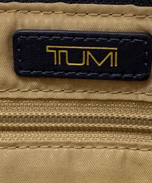 TUMI（トゥミ）TUMI (トゥミ) ショルダーバッグ ネイビー×ゴールドの古着・服飾アイテム