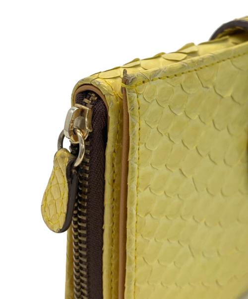 J&M DAVIDSON（ジェイ＆エム デヴィッドソン）J&M DAVIDSON (ジェイ＆エム デヴィッドソン) 2つ折り財布 イエローの古着・服飾アイテム