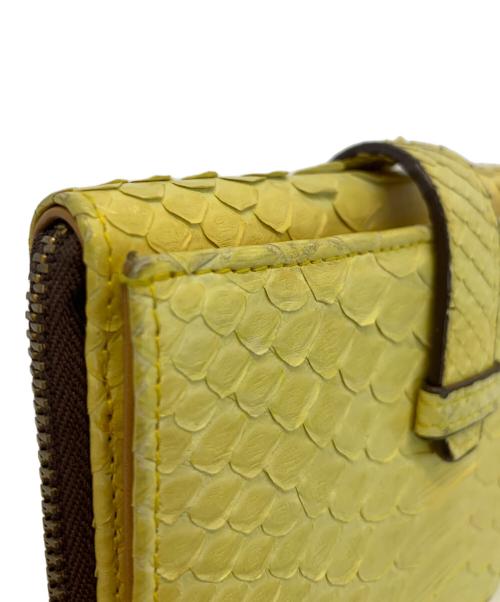 J&M DAVIDSON（ジェイ＆エム デヴィッドソン）J&M DAVIDSON (ジェイ＆エム デヴィッドソン) 2つ折り財布 イエローの古着・服飾アイテム