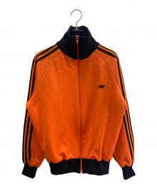 adidas（アディダス）の古着「トラックジャケット」｜オレンジ×ブラック