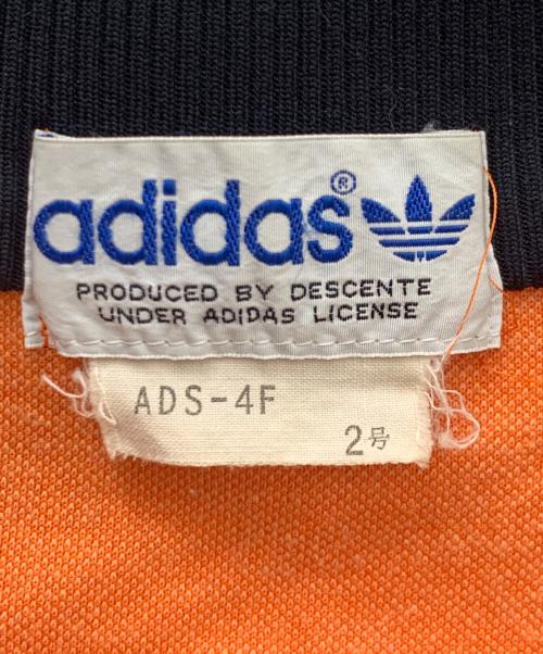 adidas（アディダス）adidas (アディダス) トラックジャケット オレンジ×ブラック サイズ:2号の古着・服飾アイテム