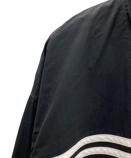 adidas（アディダス）adidas (アディダス) ナイロンジャケットback logo Flames ブラック サイズ:2XLの古着・服飾アイテム