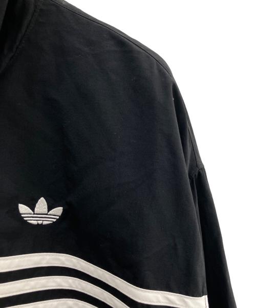 adidas（アディダス）adidas (アディダス) ナイロンジャケットback logo Flames ブラック サイズ:2XLの古着・服飾アイテム