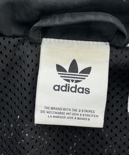 adidas（アディダス）adidas (アディダス) ナイロンジャケットback logo Flames ブラック サイズ:2XLの古着・服飾アイテム