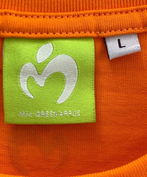 Mrs.GREEN APPLE（ミセスグリーンアップル）Mrs.GREEN APPLE (ミセスグリーンアップル) プリントTシャツ オレンジ サイズ:L 未使用品の古着・服飾アイテム