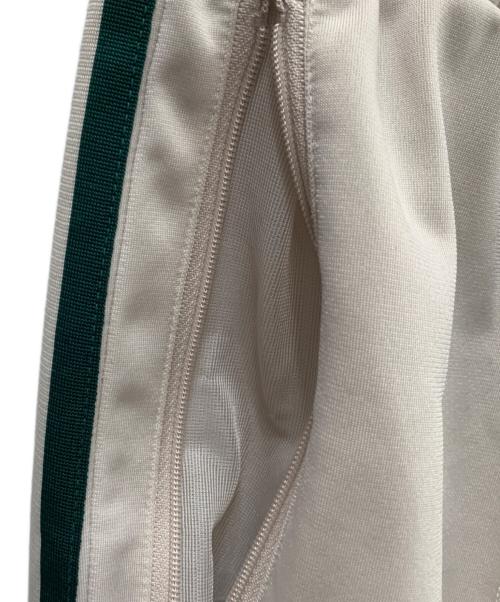 adidas（アディダス）adidas (アディダス) トラックパンツ ベージュ×グリーン サイズ:Ｍ 未使用品の古着・服飾アイテム