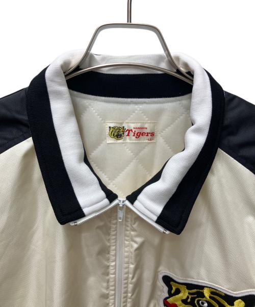 阪神タイガース（ハンシンタイガース）阪神タイガース (ハンシンタイガース) asics (アシックス) ジャンパー アイボリー×ブラック サイズ:LLの古着・服飾アイテム