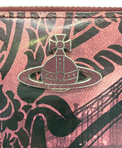 Vivienne Westwood（ヴィヴィアンウエストウッド）Vivienne Westwood (ヴィヴィアンウエストウッド) エナメル長財布 パープル×ブラックの古着・服飾アイテム