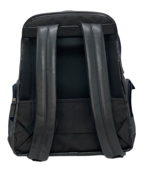 TUMI（トゥミ）TUMI (トゥミ) レザーリュック ネイビー×ブラックの古着・服飾アイテム