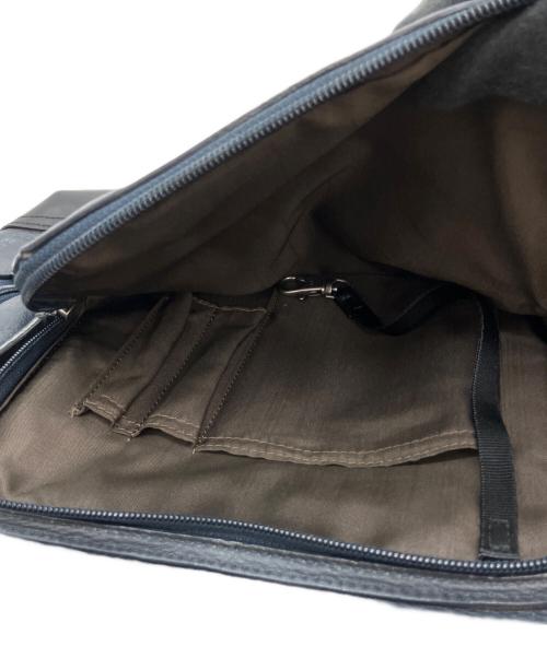 TUMI（トゥミ）TUMI (トゥミ) レザーリュック ネイビー×ブラックの古着・服飾アイテム