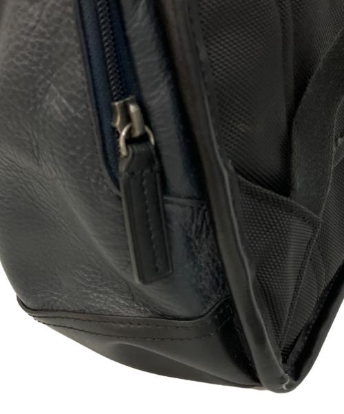 TUMI（トゥミ）TUMI (トゥミ) レザーリュック ネイビー×ブラックの古着・服飾アイテム