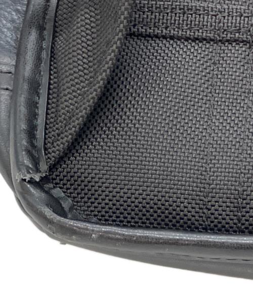 TUMI（トゥミ）TUMI (トゥミ) レザーリュック ネイビー×ブラックの古着・服飾アイテム